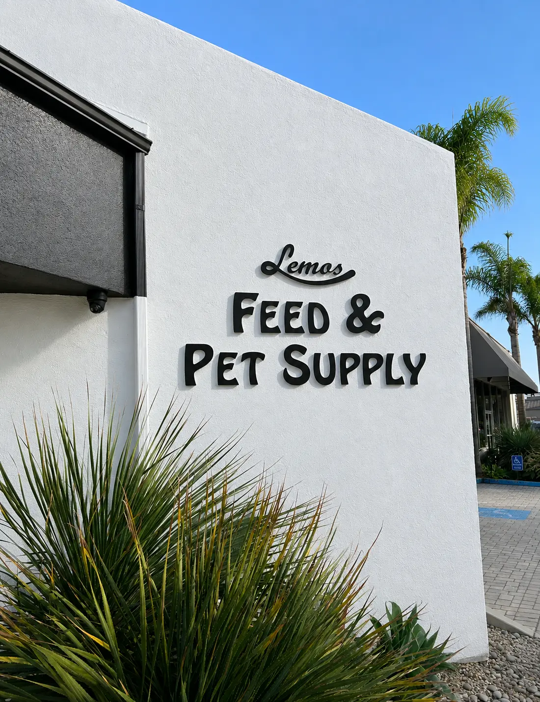 After — commercial storefront repaint of Lemos Feed & Pet Supply in Santa Barbara by Mission Creek Painting